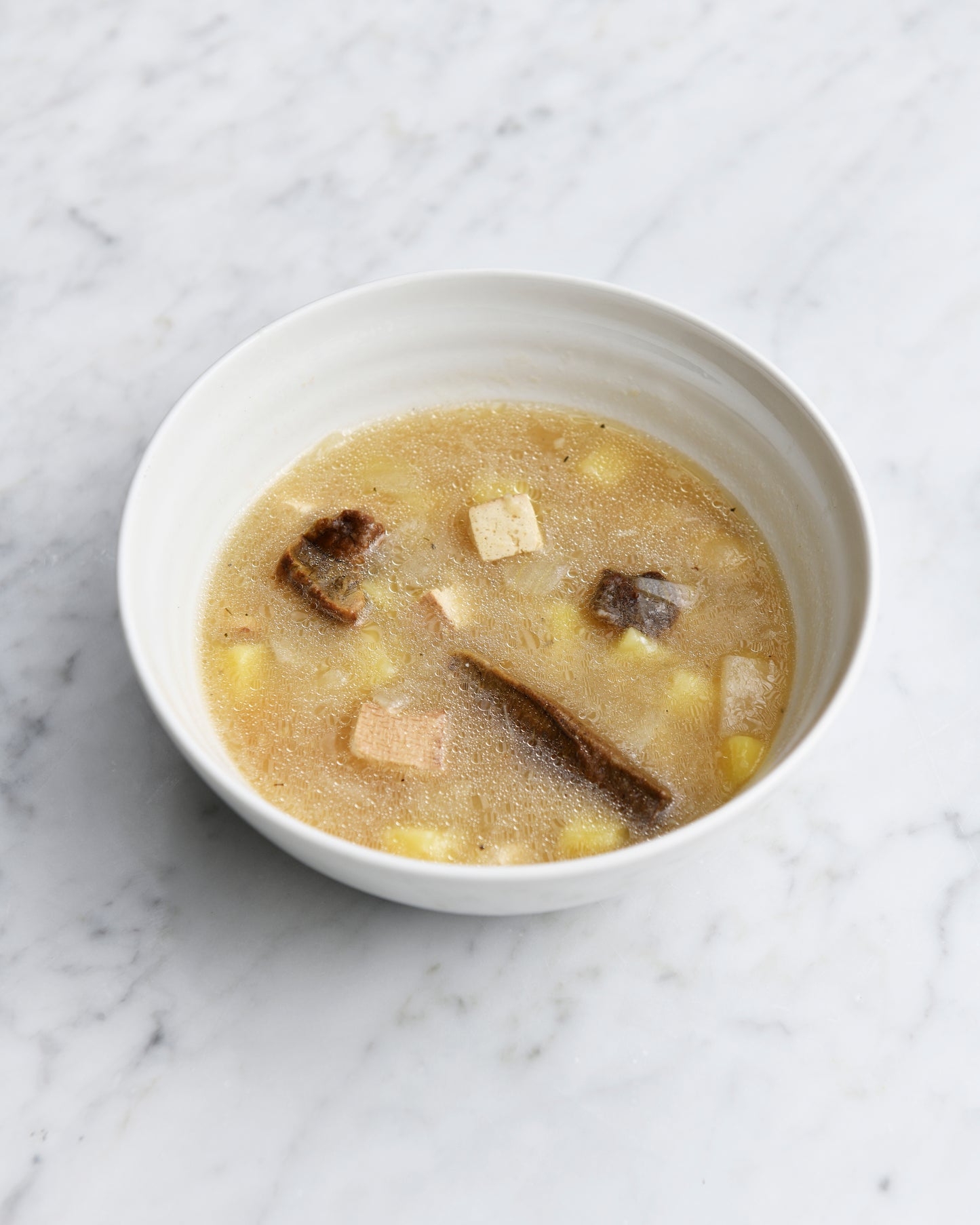 vegan sour soup with smoked tofu, potatoes, horseradish and cashew cream 500 ml